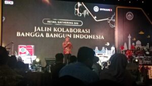 Keterangan Foto : Kepala Dinas Perindustrian dan Perdagangan Provinsi Lampung, Dra. Evie Fatmawaty, M.Si., menyampaikan sambutan dalam acara Retail Gathering SIG 2025 di Bandar Lampung.